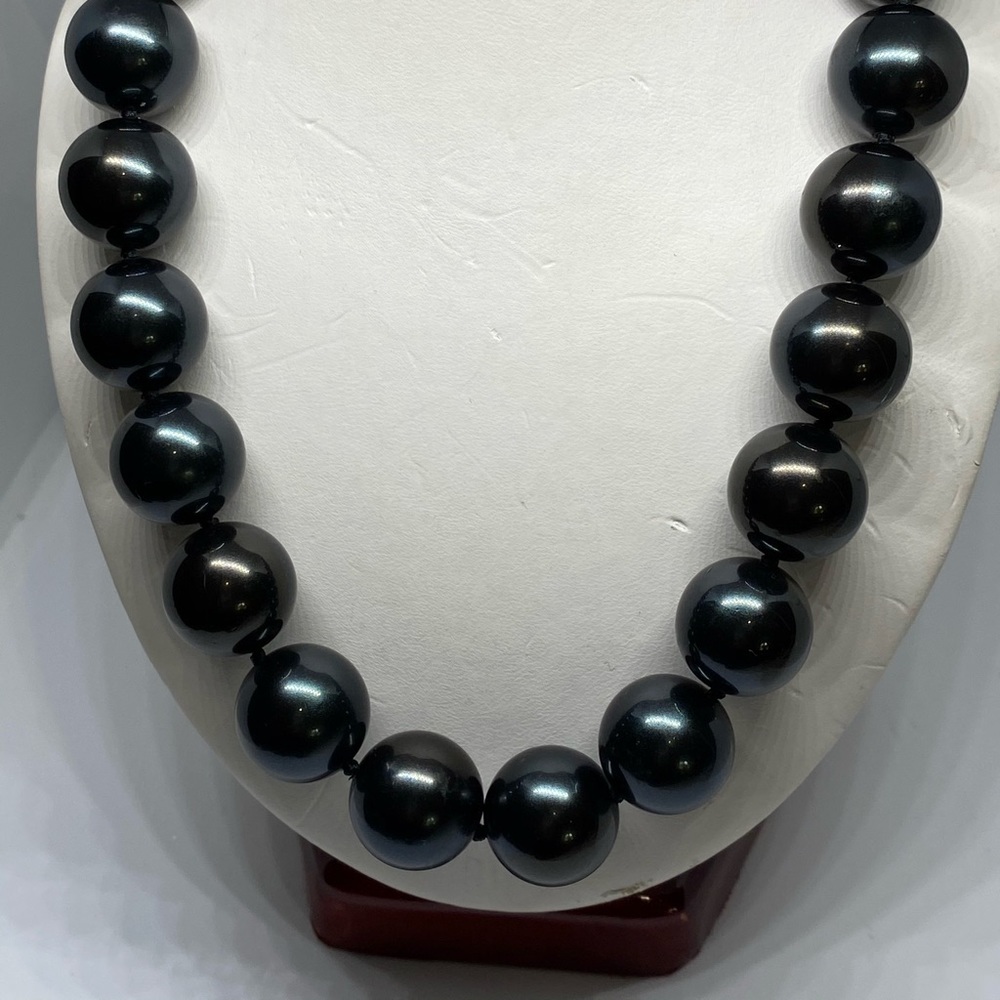 16 MM black mother of pearl with marcasite clasp